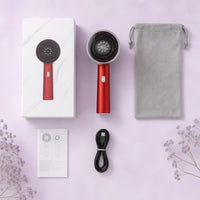 Qué incluye el peine masajeador en rojo: caja, cable USB-C, bolsa y manual